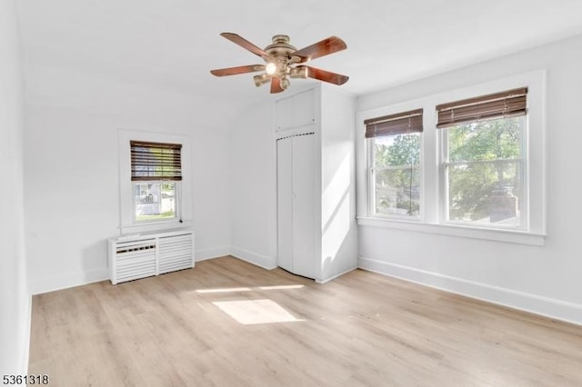 39 Johnson Rd, West Orange Twp, NJ 07052 - spare room featuring healthy amount of natural light, light wood-style floors, baseboards, a ceiling fan, and vaulted ceiling