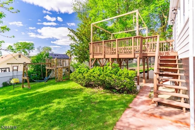 39 Johnson Rd, West Orange Twp, NJ 07052 - view of yard with a playground, stairway, and a wooden deck