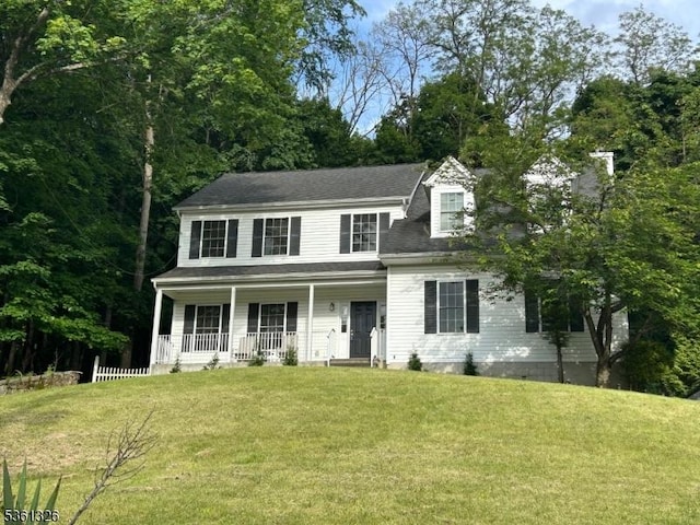 1 Elm St, High Bridge Boro, NJ 08829 - colonial-style house featuring covered porch and a front yard