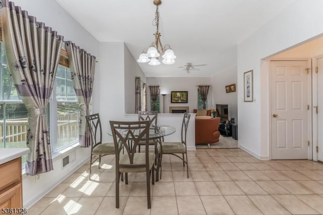 1 Elm St, High Bridge Boro, NJ 08829 - dining area with a chandelier, a ceiling fan, and light tile patterned flooring