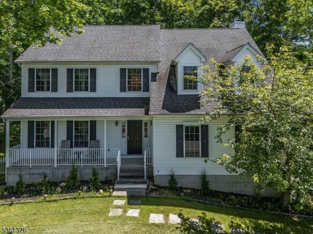 1 Elm St, High Bridge Boro, NJ 08829 - view of front of home featuring a porch, a front yard, and a shingled roof