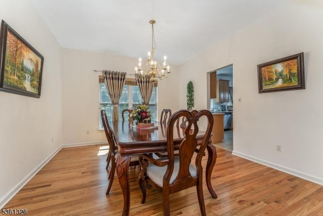 1 Elm St, High Bridge Boro, NJ 08829 - dining area featuring a chandelier, light wood-style floors, and baseboards