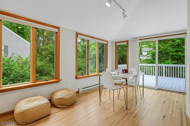 908 Willow Grove Rd, Westfield Town, NJ 07090 - sunroom / solarium with rail lighting, plenty of natural light, lofted ceiling, and a baseboard heating unit