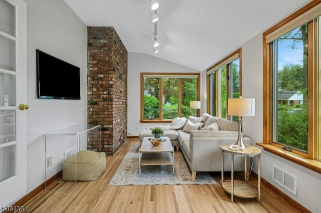 908 Willow Grove Rd, Westfield Town, NJ 07090 - living area with wood finished floors, baseboards, and vaulted ceiling