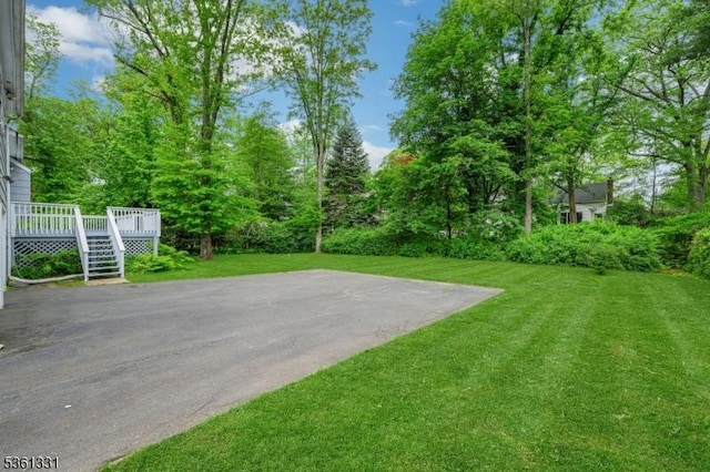 908 Willow Grove Rd, Westfield Town, NJ 07090 - view of grassy yard featuring a wooden deck and stairway
