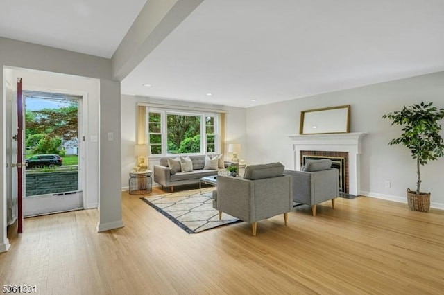 908 Willow Grove Rd, Westfield Town, NJ 07090 - living area featuring light wood-type flooring, baseboards, a brick fireplace, and recessed lighting
