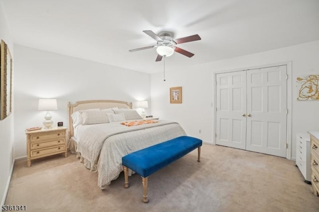 2 Skyline Dr, Morris Twp, NJ 07960 - bedroom with light carpet, a closet, ceiling fan, and baseboards