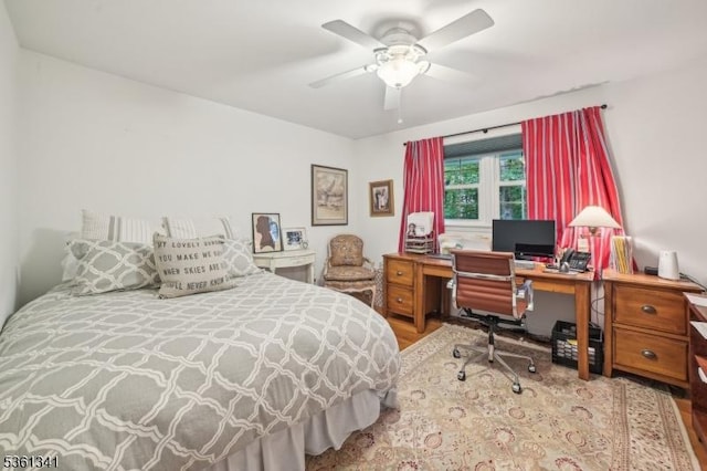 2 Skyline Dr, Morris Twp, NJ 07960 - bedroom with wood finished floors, ceiling fan, and an office area