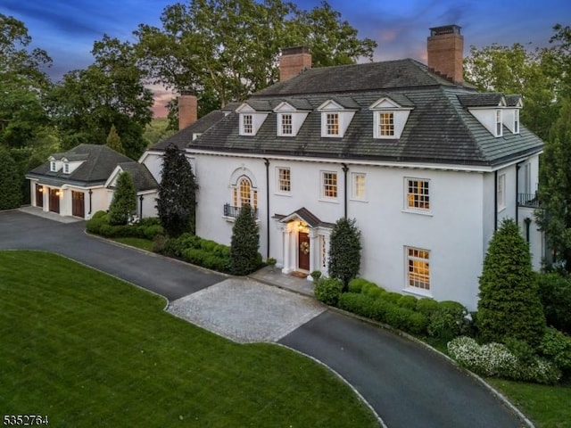 10 Rowan Rd, Summit City, NJ 07901 - french provincial home with a chimney, stucco siding, a front lawn, and asphalt driveway