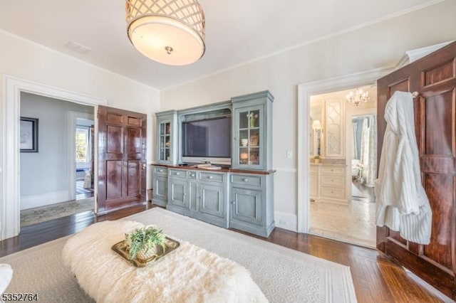 10 Rowan Rd, Summit City, NJ 07901 - bedroom with a chandelier, baseboards, ornamental molding, and dark wood finished floors
