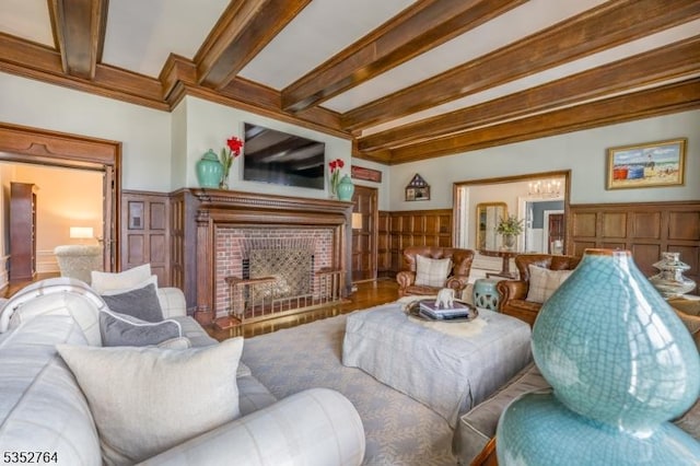 10 Rowan Rd, Summit City, NJ 07901 - living room featuring beam ceiling, a fireplace, a decorative wall, and ornamental molding