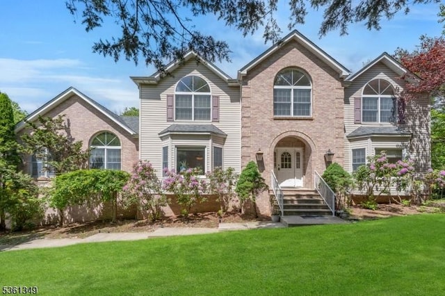 153 Burnt Meadow Rd, Ringwood Boro, NJ 07456 - view of front of home with a front lawn and brick siding