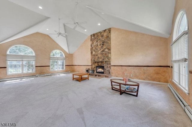 153 Burnt Meadow Rd, Ringwood Boro, NJ 07456 - unfurnished living room with baseboard heating, high vaulted ceiling, carpet floors, ceiling fan, and a stone fireplace
