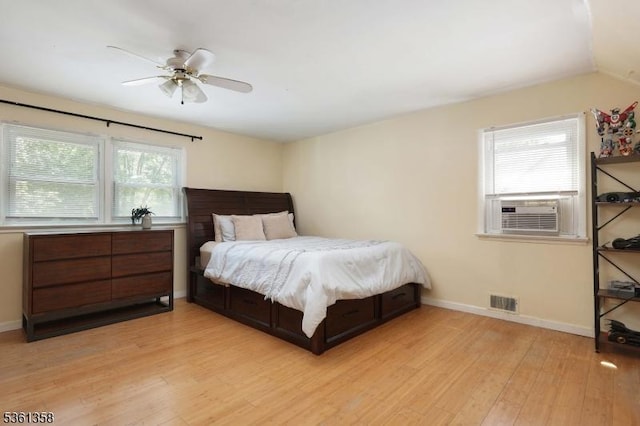 992 Milton Blvd, Rahway City, NJ 07065 - bedroom with cooling unit, light wood finished floors, and a ceiling fan