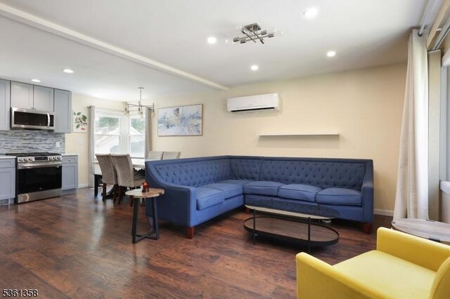 992 Milton Blvd, Rahway City, NJ 07065 - living room with an AC wall unit, recessed lighting, and dark wood-style flooring