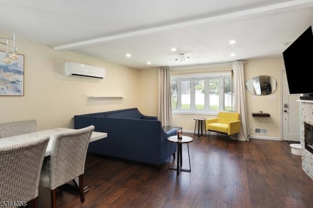 992 Milton Blvd, Rahway City, NJ 07065 - living area featuring a wall unit AC, hardwood / wood-style floors, a fireplace, recessed lighting, and beam ceiling
