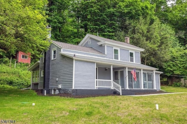 18 Ann St, Knowlton Twp, NJ 07832 - view of front of home featuring a porch, a chimney, a front lawn, and roof with shingles