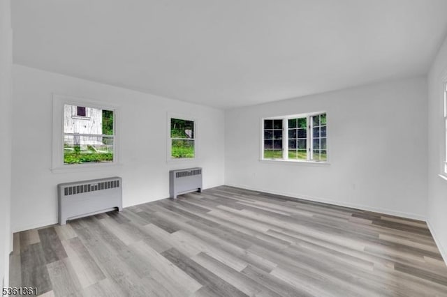 18 Ann St, Knowlton Twp, NJ 07832 - spare room featuring radiator, healthy amount of natural light, and wood finished floors