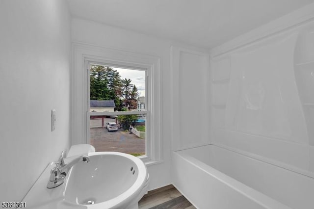 18 Ann St, Knowlton Twp, NJ 07832 - bathroom featuring wood finished floors, a sink, and shower / tub combination