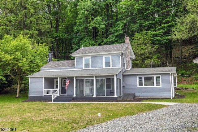 18 Ann St, Knowlton Twp, NJ 07832 - view of front of home with a chimney, a porch, a front yard, roof with shingles, and a view of trees
