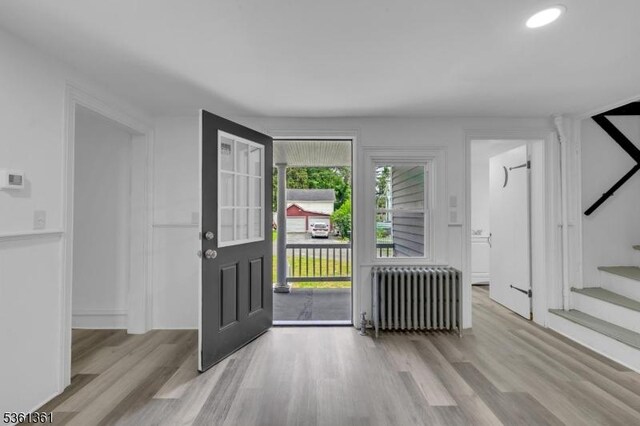 18 Ann St, Knowlton Twp, NJ 07832 - entryway featuring radiator, wood finished floors, stairs, and recessed lighting
