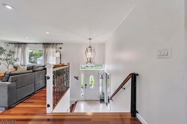 86 Belmont Ave, Cranford Twp, NJ 07016 - entrance foyer featuring a chandelier, recessed lighting, wood finished floors, and baseboards