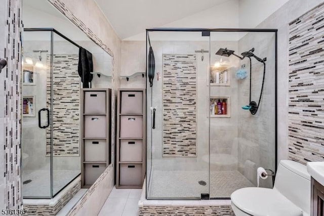 86 Belmont Ave, Cranford Twp, NJ 07016 - full bath featuring toilet, a shower stall, tile patterned flooring, lofted ceiling, and vanity