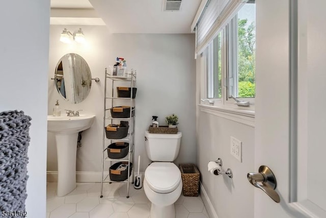 86 Belmont Ave, Cranford Twp, NJ 07016 - bathroom with toilet, tile patterned flooring, and baseboards