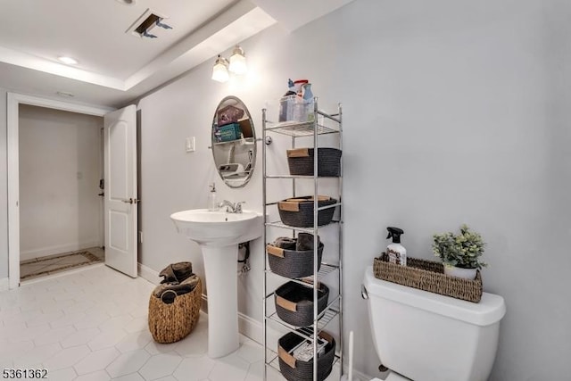 86 Belmont Ave, Cranford Twp, NJ 07016 - bathroom with toilet, tile patterned flooring, and a sink