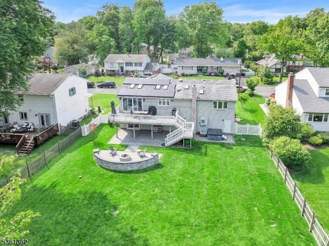 86 Belmont Ave, Cranford Twp, NJ 07016 - back of property with a wooden deck, a fire pit, stairs, and a residential view