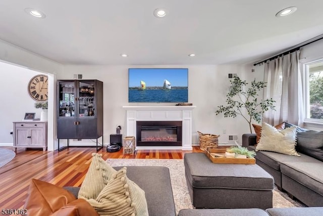 86 Belmont Ave, Cranford Twp, NJ 07016 - living area with wood finished floors, recessed lighting, and a glass covered fireplace