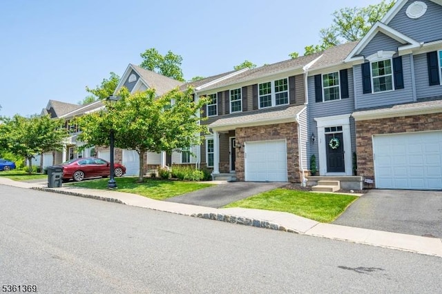 11 Woodland Way, Mount Arlington Boro, NJ 07856 - multi unit property featuring asphalt driveway, stone siding, a garage, and a front yard