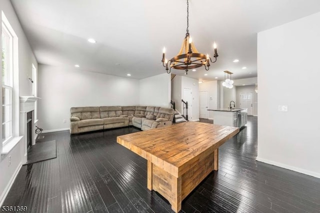11 Woodland Way, Mount Arlington Boro, NJ 07856 - living room with a chandelier, baseboards, dark wood-type flooring, recessed lighting, and a fireplace