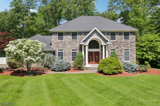 25 Castle Ct, Randolph Twp, NJ 07869 - view of front of property with a front yard and stone siding