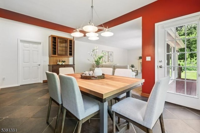 25 Castle Ct, Randolph Twp, NJ 07869 - dining area featuring a chandelier and dark tile patterned flooring