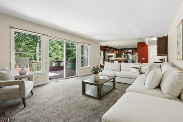 25 Castle Ct, Randolph Twp, NJ 07869 - carpeted living room featuring baseboards