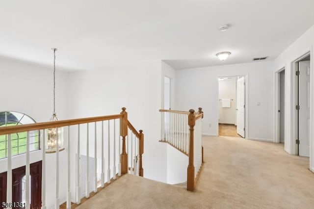 25 Castle Ct, Randolph Twp, NJ 07869 - corridor with an upstairs landing and carpet floors