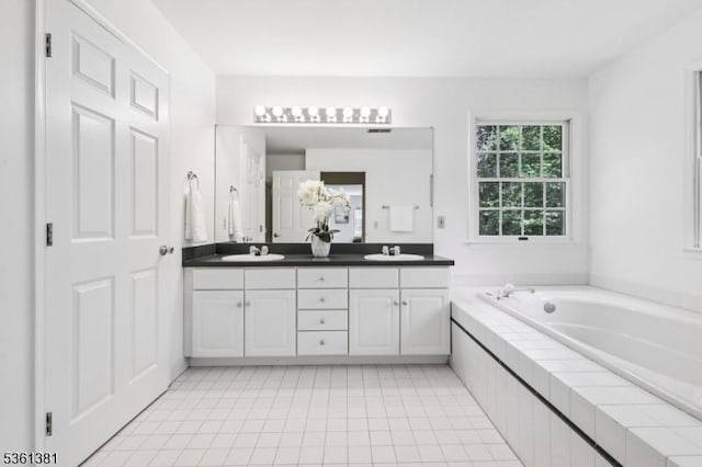 25 Castle Ct, Randolph Twp, NJ 07869 - full bathroom with double vanity, a bath, and tile patterned floors