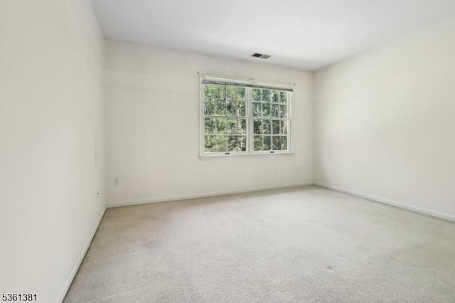 25 Castle Ct, Randolph Twp, NJ 07869 - carpeted spare room with baseboards