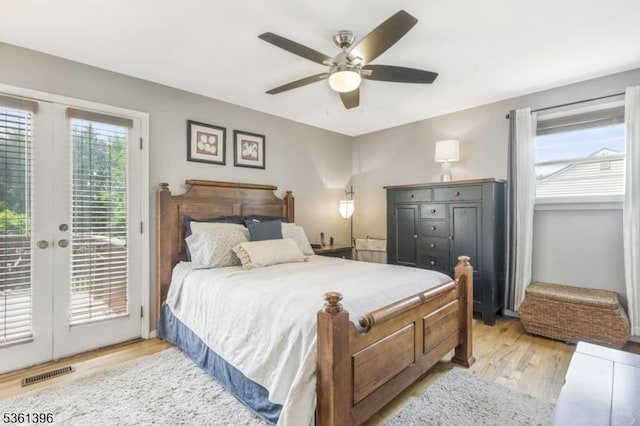 22 Messig Rd, Clinton Town, NJ 08809 - bedroom with access to exterior, light wood finished floors, french doors, and a ceiling fan