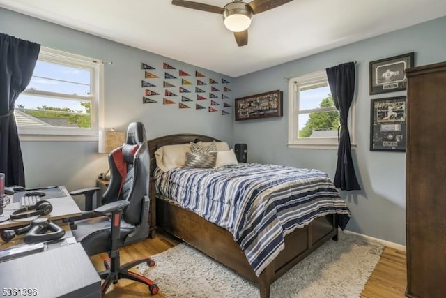 22 Messig Rd, Clinton Town, NJ 08809 - bedroom featuring wood finished floors, an office area, and ceiling fan