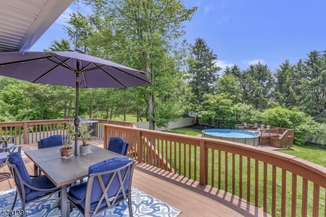 22 Messig Rd, Clinton Town, NJ 08809 - deck featuring outdoor dining space, an outdoor pool, and view of wooded area
