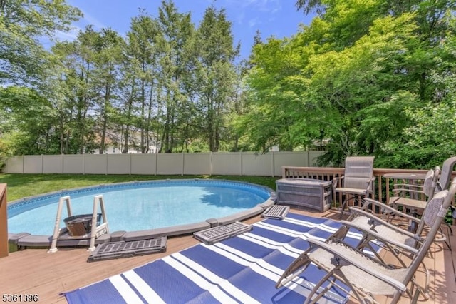 22 Messig Rd, Clinton Town, NJ 08809 - view of pool with a fenced backyard, a deck, and view of wooded area