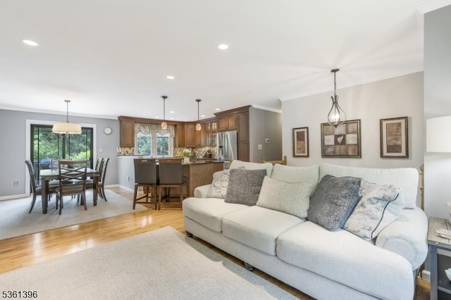 22 Messig Rd, Clinton Town, NJ 08809 - living area with light wood finished floors, recessed lighting, baseboards, and ornamental molding