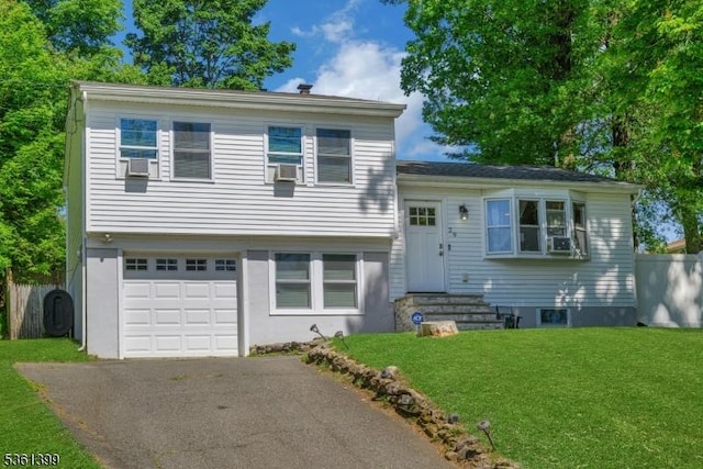 29 Black Oak Dr, Vernon Twp, NJ 07462 - split level home with an attached garage, driveway, and cooling unit