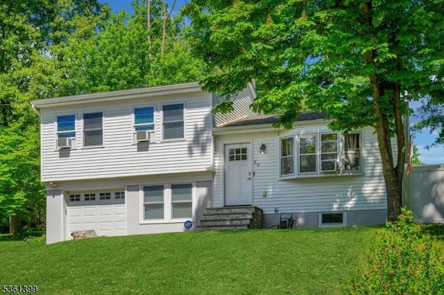29 Black Oak Dr, Vernon Twp, NJ 07462 - tri-level home featuring an attached garage, a front yard, and cooling unit