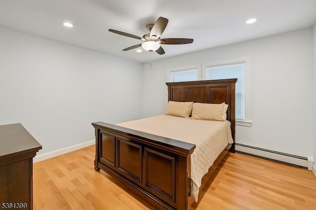 29 Black Oak Dr, Vernon Twp, NJ 07462 - bedroom featuring a baseboard heating unit, light wood-style flooring, recessed lighting, ceiling fan, and baseboards