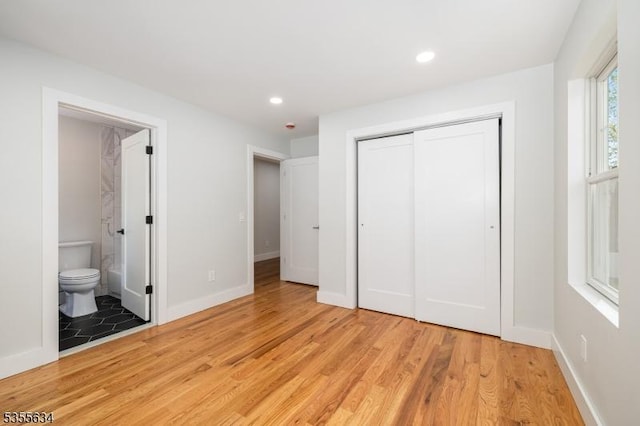 1314 Pine Grove Ave, Westfield Town, NJ 07090 - unfurnished bedroom featuring light wood-style flooring, a closet, recessed lighting, ensuite bath, and baseboards