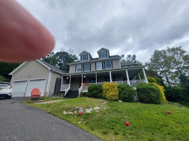 4 Babbitt Ct, Newton Town, NJ 07860 - view of front of home featuring a porch, a front yard, an attached garage, and asphalt driveway