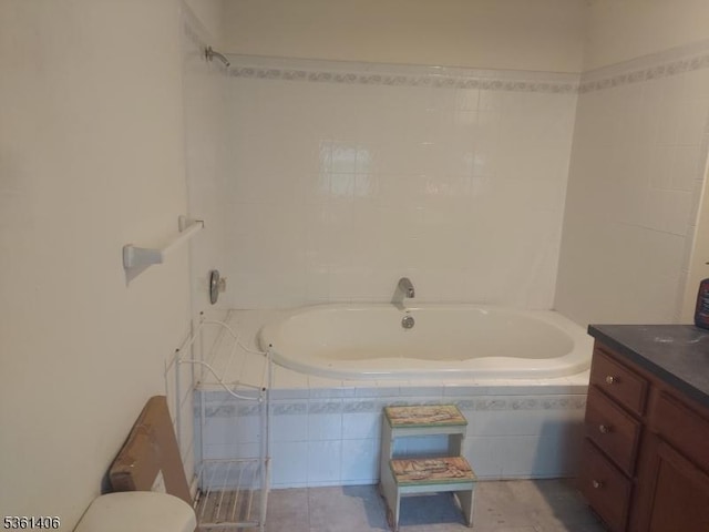 4 Babbitt Ct, Newton Town, NJ 07860 - bathroom with tiled tub, vanity, toilet, and tile patterned flooring